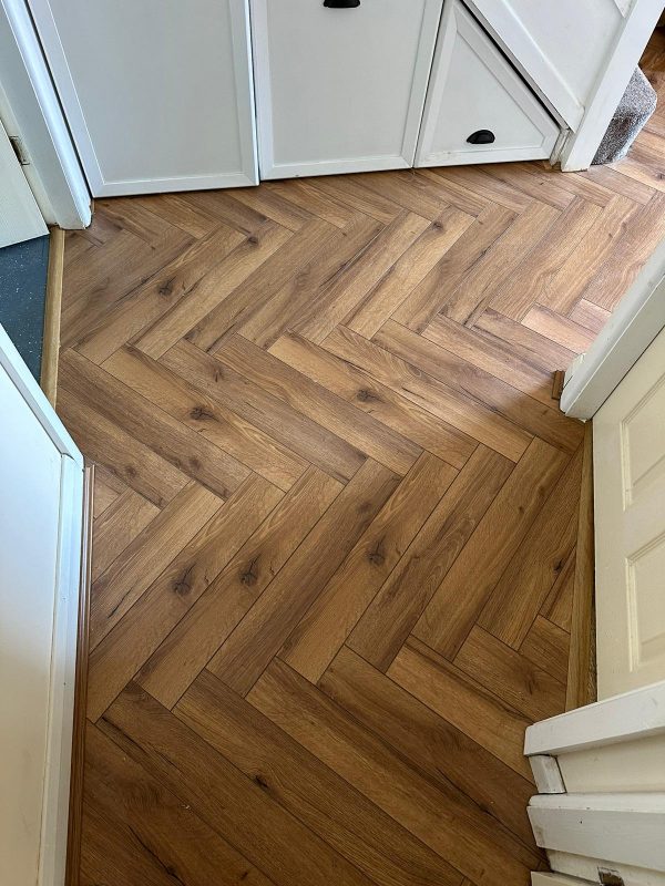 Oak robust fumed herringbone flooring in hallway