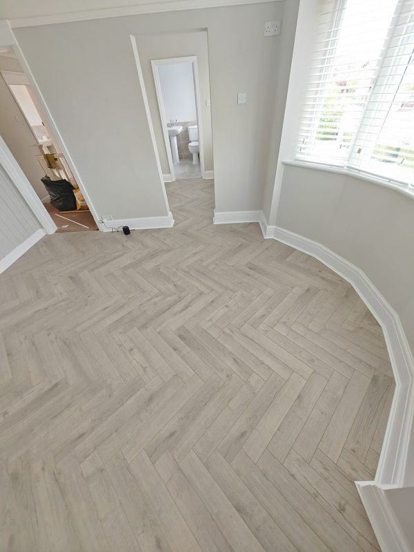 Oak robust grey herringbone in master bedroom