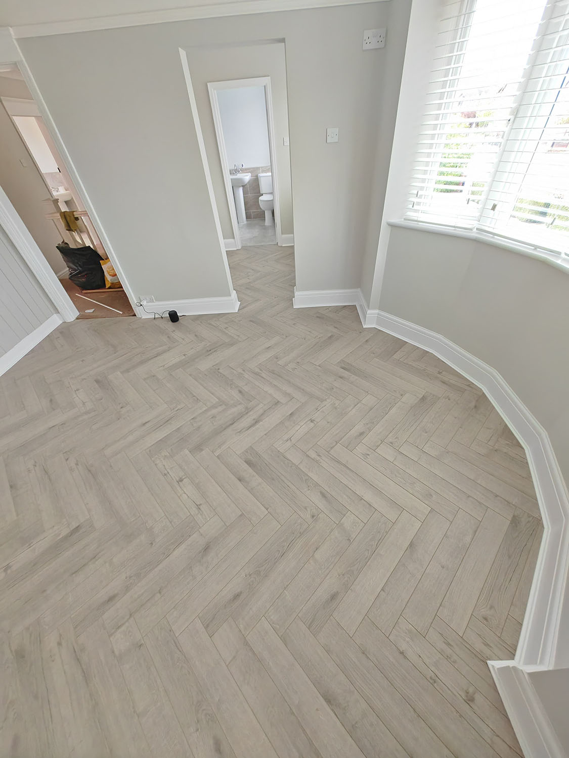 Oak robust grey herringbone in master bedroom