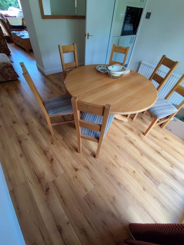 Oak robust natural plank flooring in dining room