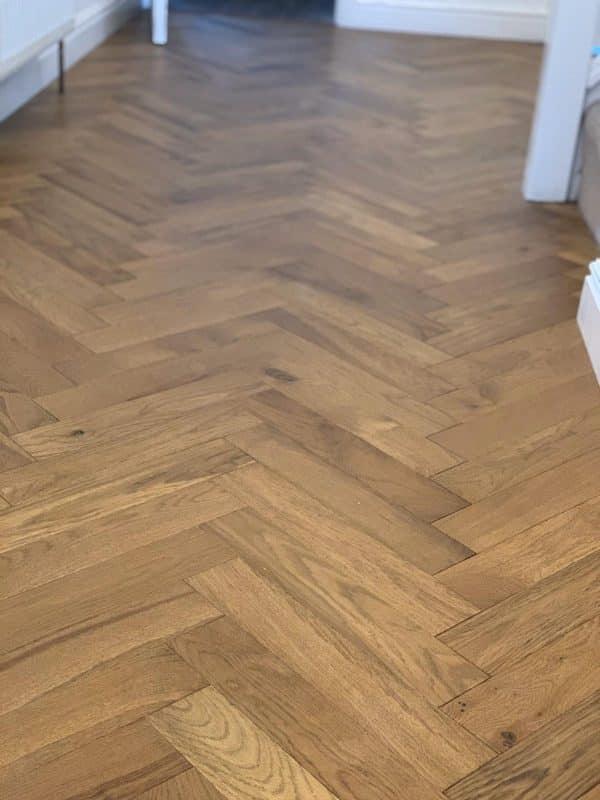 Engineered herringbone golden oak close up