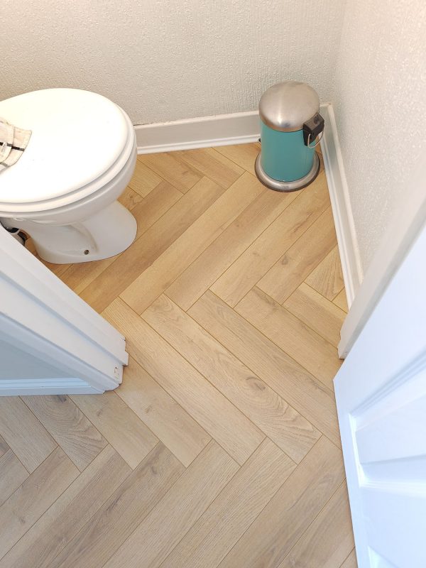 Warren oak herringbone in small bathroom