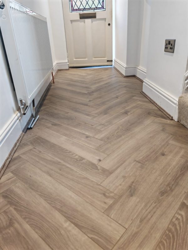 Riverbed oak herringbone flooring in entrance