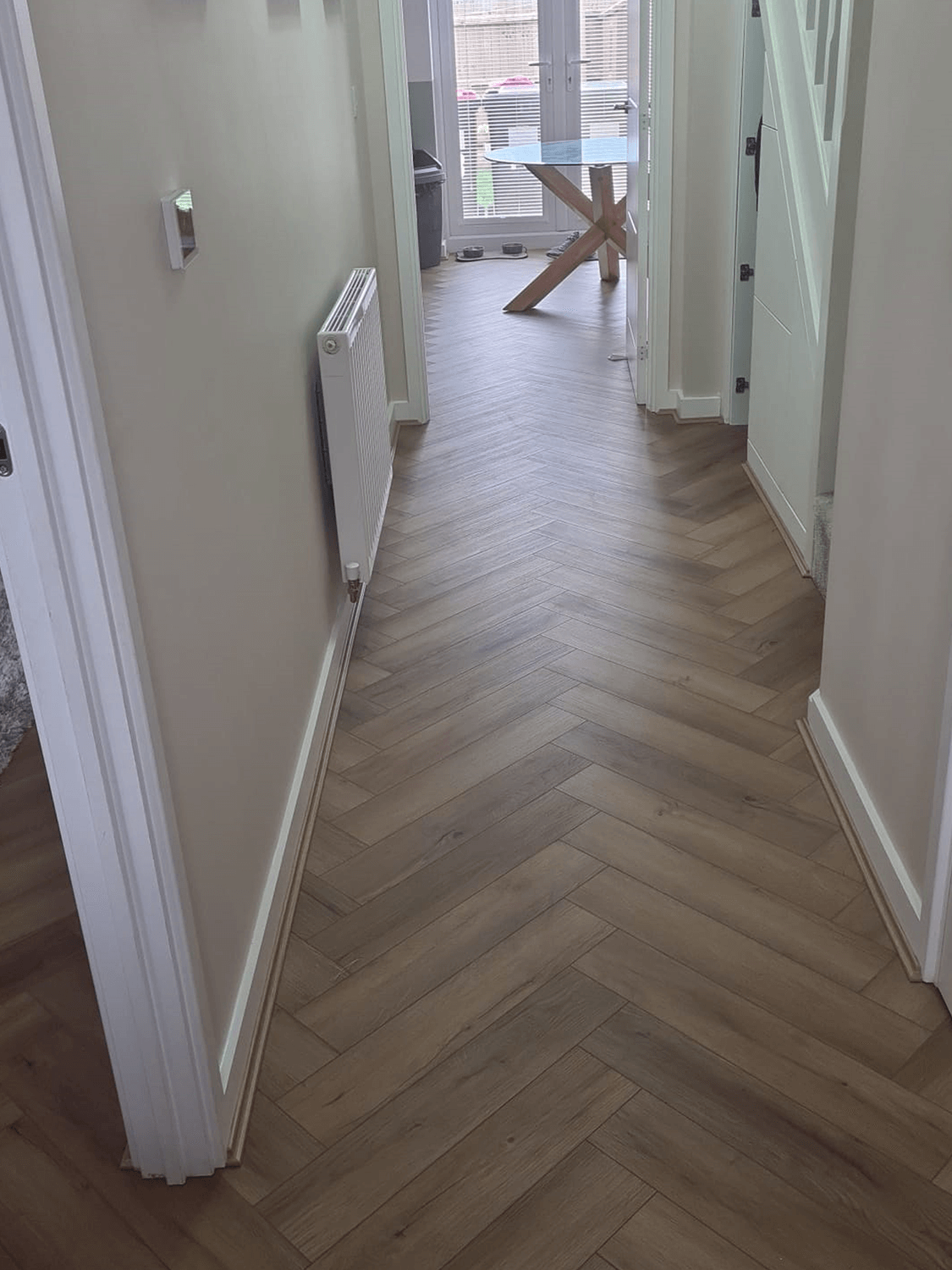 Barley Herringbone SPC in hallway